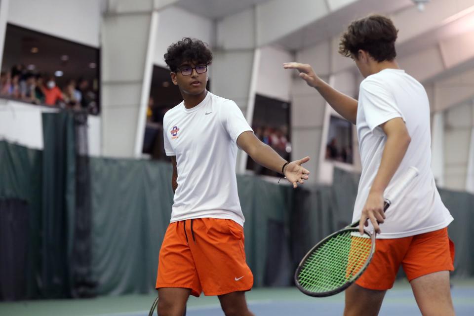 Olentangy Orange's Parth Patel and Kallan Arledge celebrate a point in their opening Division I state doubles match May 27. The duo went on to finish third May 28.