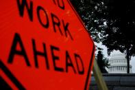 FILE PHOTO: A general view of the U.S. Capitol and a nearby construction sign in Washington