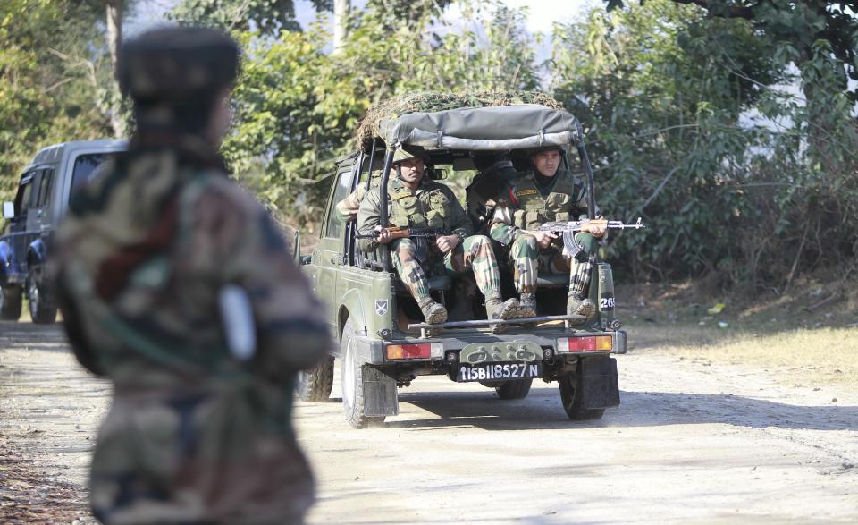 Indian army soldier patrols during a search operation outside the camp of the General Engineering Reserve Force (GREF), the site of a militant attack, in the frontier Battal area, about 90 kilometers from Jammu, India, Monday, Jan. 9, 2017. The Indian army says three civilian laborers working with an army road construction crew were killed in a pre-dawn militant attack near the border with Pakistan in Indian-controlled Kashmir. (AP photo/Channi Anand)