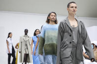 Models wear creations for the Gauchere Spring-Summer 2021 fashion collection, Wednesday, Sept. 30, 2020, during Paris fashion week. (Photo by Vianney Le Caer/Invision/AP)