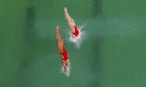 2016 Rio Olympics - Diving - Final - Women's Synchronised 10m Platform - Maria Lenk Aquatics Centre - Rio de Janeiro, Brazil - 09/08/2016. Amy Cozad (USA) of USA and Jessica Parratto (USA) of USA compete. REUTERS/Michael Dalder FOR EDITORIAL USE ONLY. NOT FOR SALE FOR MARKETING OR ADVERTISING CAMPAIGNS.