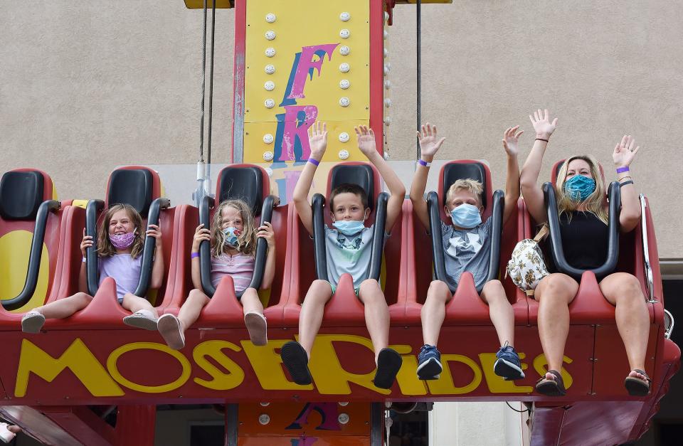 After a closure due to the COVID-19 pandemic, Funland on the boardwalk in Rehoboth Beach reopened rides with reservations, masks and social distancing required.