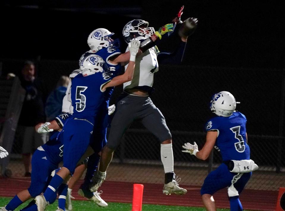 Pinnacle's Duce Robinson (2) comes up just short on a Hail Mary attempt against Sandra Day O'Connor's defense at the close of the first half during their first-round 6A playoff game in Phoenix on Nov. 19, 2021.