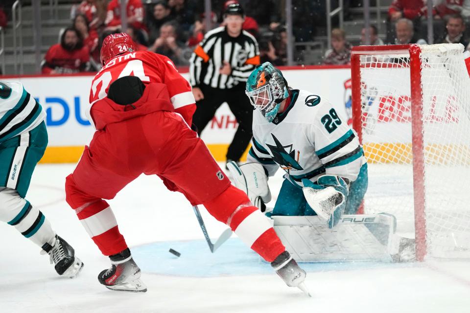 Detroit Red Wings center Klim Kostin (24) scores on San Jose Sharks goaltender Mackenzie Blackwood (29) in the second period at Little Caesars Arena in Detroit on Thursday, Dec. 7, 2023.