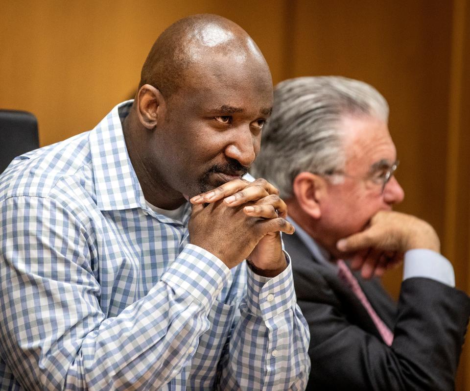 Murder defendant Marcelle Waldon listens to testimony earlier this week in his first degree murder trial in Bartow. On Wednesday, the jury heard about text messages he shared with another man the day Edie Yates Henderson and David Henderson were killed in their Lake Morton home.