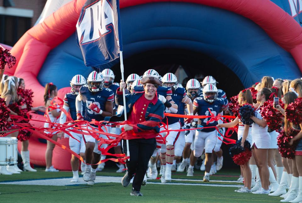 The Madison-Ridgeland Academy Patriots take the field to face Magnolia Heights in Madison, Miss., Friday, Aug. 18, 2023.