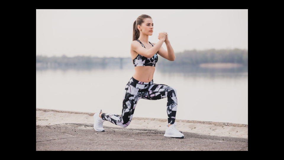 A woman performing a lunge