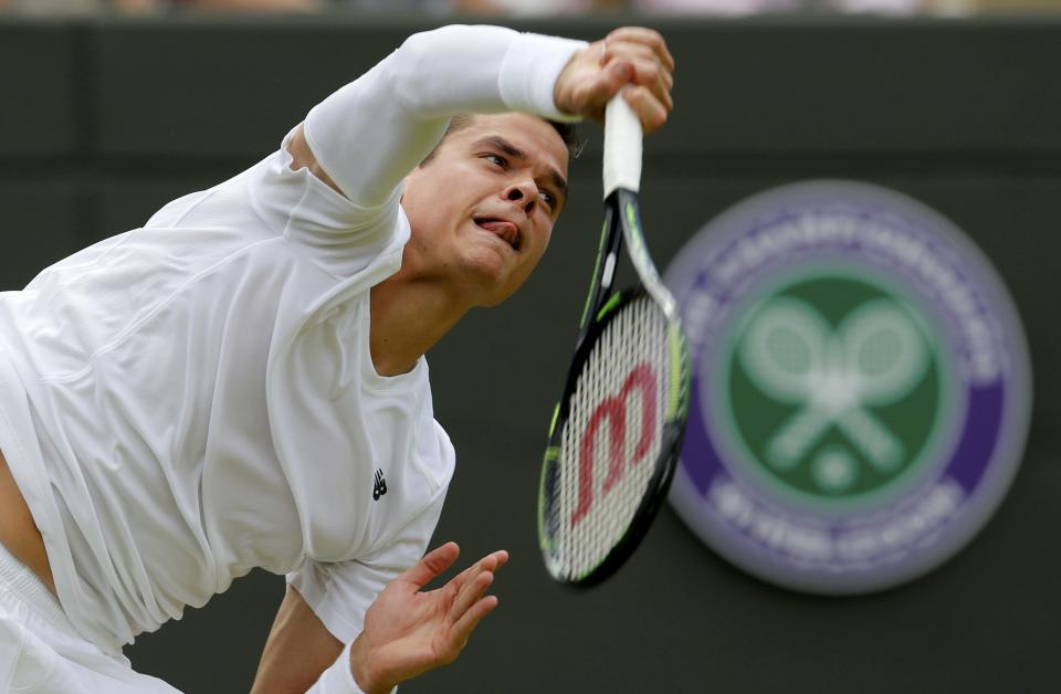 Milos Raonic of Canada serves during his match against Tommy Haas of Germany at the Wimbledon Tennis Championships in London, July 1, 2015. REUTERS/Suzanne Plunkett