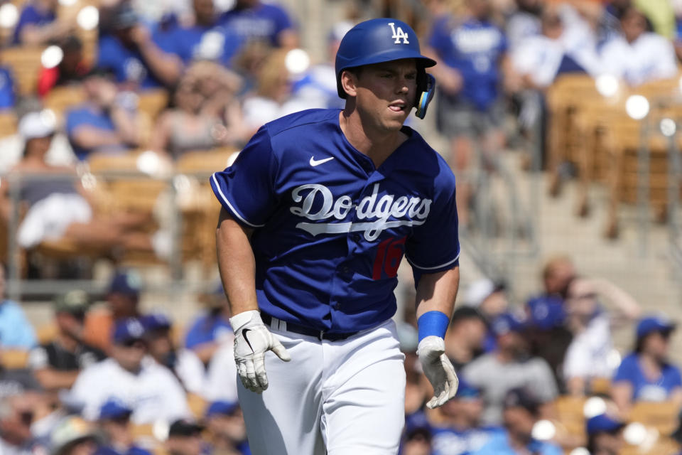 Mar 20, 2022; Phoenix, Arizona, USA; Los Angeles Dodgers catcher Will Smith (16) hits against the Chicago Cubs in the first inning during a spring training game at Camelback Ranch-Glendale. Mandatory Credit: Rick Scuteri-USA TODAY Sports