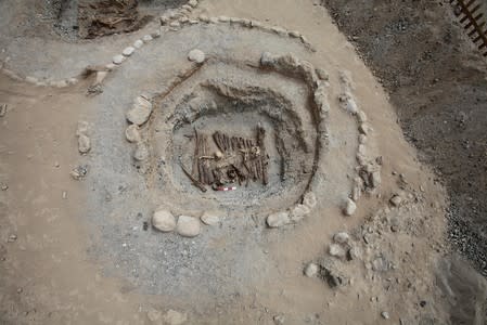 Excavation of a tomb from an archaeological site in the Pamir Mountains in Xinjiang region