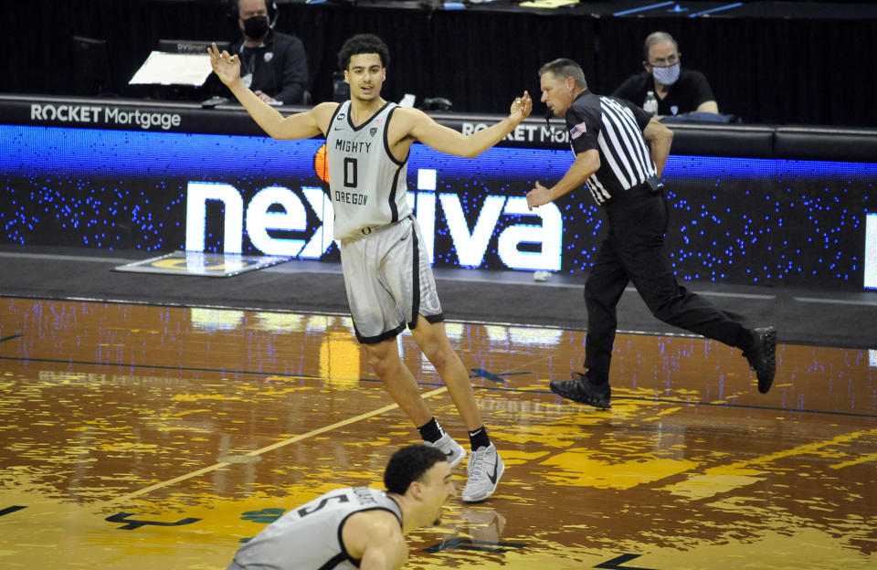 Oregon guard Will Richardson (0) celebrates making a three-point shot during the second half of an NCAA college basketball game against UCLA Wednesday, March 3, 2021, in Eugene, Ore. (AP Photo/Andy Nelson)