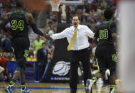 Baylor coach Scott Drew greets Cory Jefferson (34) and Royce O'Neale (00) during a regional semifinal NCAA college basketball tournament game against Wisconsin, Thursday, March 27, 2014, in Anaheim, Calif. (AP Photo/Mark J. Terrill)