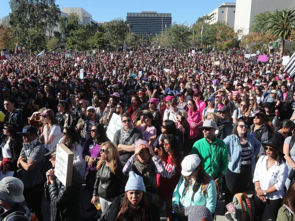 Thousands of demonstrators listen to speakers at the Women's March in Los Angeles, California, on 20 January 2018. (EPA)