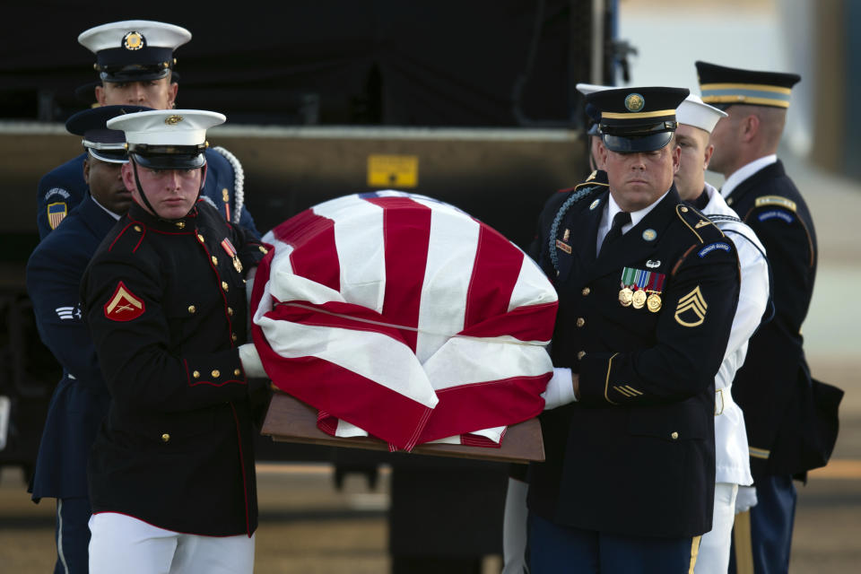 An armed forces color guard carries a casket containing the body of U.S. Sen. Dianne Feinstein, D-Calif., at San Francisco International Airport, Saturday, Sept. 30, 2023, in San Francisco. (AP Photo/D. Ross Cameron)