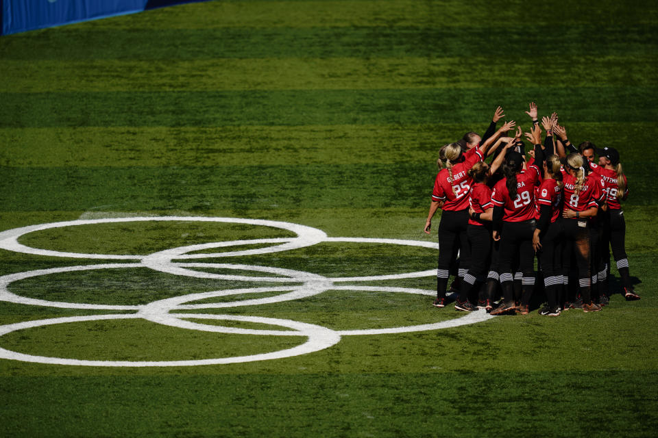 Members of team Canada meet after a softball game against Mexico at the 2020 Summer Olympics, Tuesday, July 27, 2021, in Yokohama, Japan. Canada won 3-2. (AP Photo/Matt Slocum)