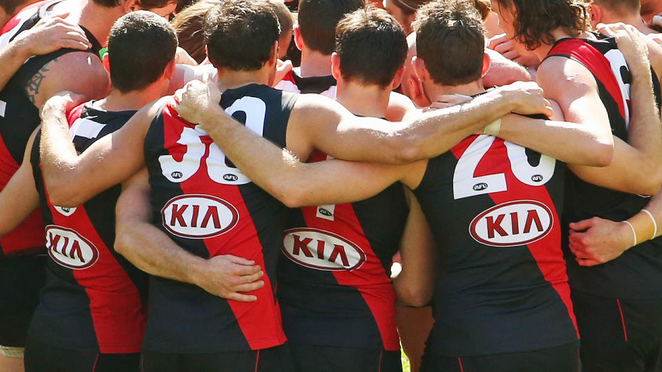 Essendon players, pictured here during the round 22 match against Gold Coast in 2014.