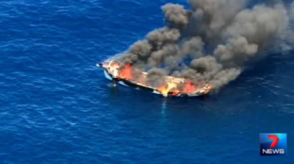 Man cheats death after 40ft boat bursts into flames