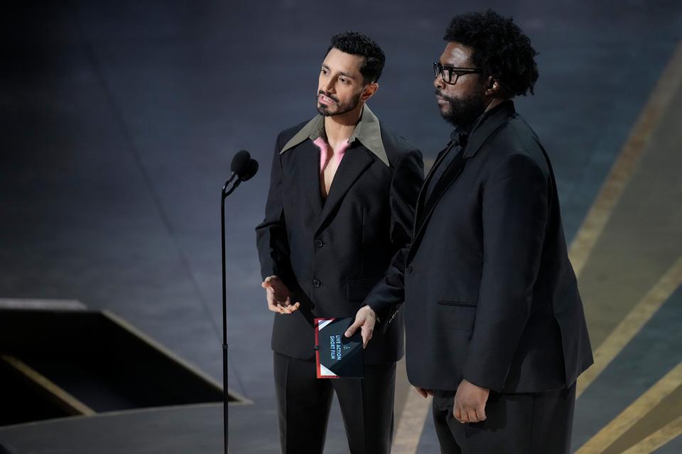 Riz Ahmed, left, and Questlove present the award for best live action short.
