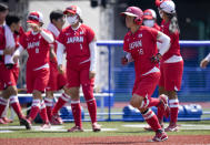 Japan's Yamato Fujita completes a home run during the softball game between Japan and Australia at the 2020 Summer Olympics, Wednesday, July 21, 2021, in Fukushima , Japan. (AP Photo/Jae C. Hong)