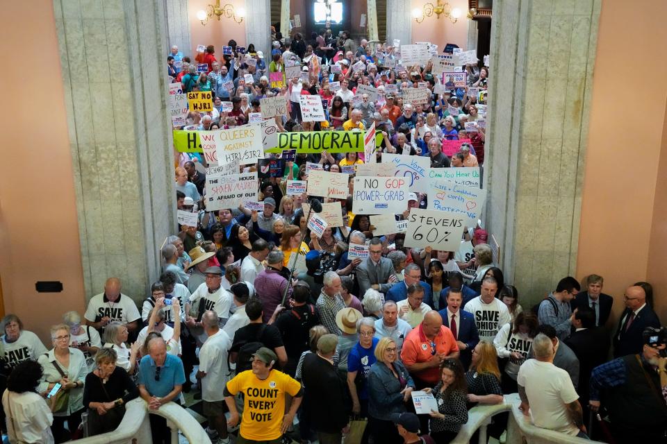 Protesters for and against the resolution convene inside the Ohio Statehouse prior to the deadline for the Ohio House to decide whether to create an August special election for a resolution that would increase the voter threshold to 60 percent for constitutional amendments.