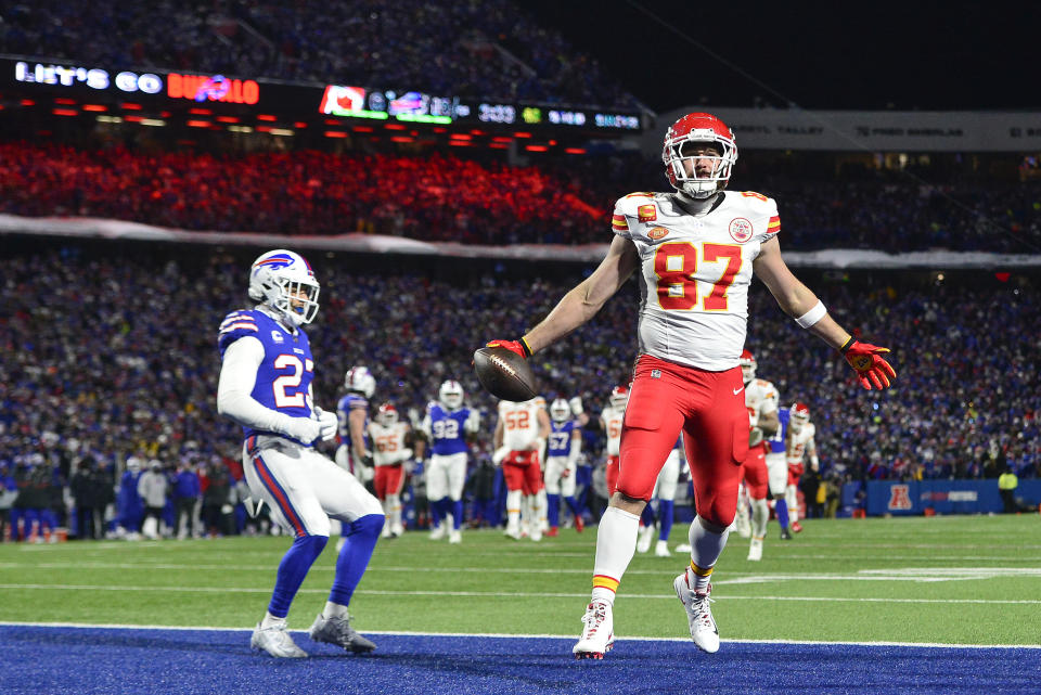 Kansas City Chiefs tight end Travis Kelce (87) scores a touchdown against the Buffalo Bills during the second quarter of an NFL AFC division playoff football game, Sunday, Jan. 21, 2024, in Orchard Park, N.Y. (AP Photo/Adrian Kraus)