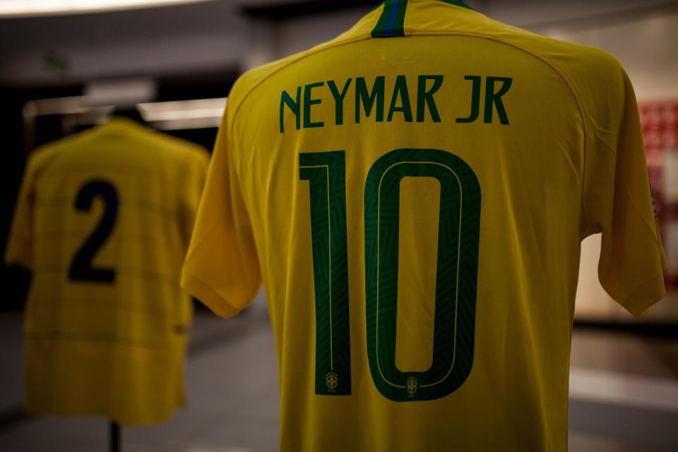 BOGOTA, COLOMBIA - JULY 05: The jersey of the Brazilian national team player, Neymar Jr, is shown during the San Siro jersey museum exhibition in Bogota, Colombia on July 05, 2019. An itinerant exhibition that has traveled for more than 25 countries, including China, Korea, Peru, Mexico and the United Arab Emirates. The museum, named after the Milan stadium, gathers several garments that travel the world in just two suitcases, the assembly has printed the photographs of the players and each shirt is located on a mannequin. Several World Cup shirts will be in Bogota in the company of football players like Pibe Valderrama, Ronaldo, Ronaldinho, Messi among others.  (Photo by Juancho Torres/Anadolu Agency/Getty Images)