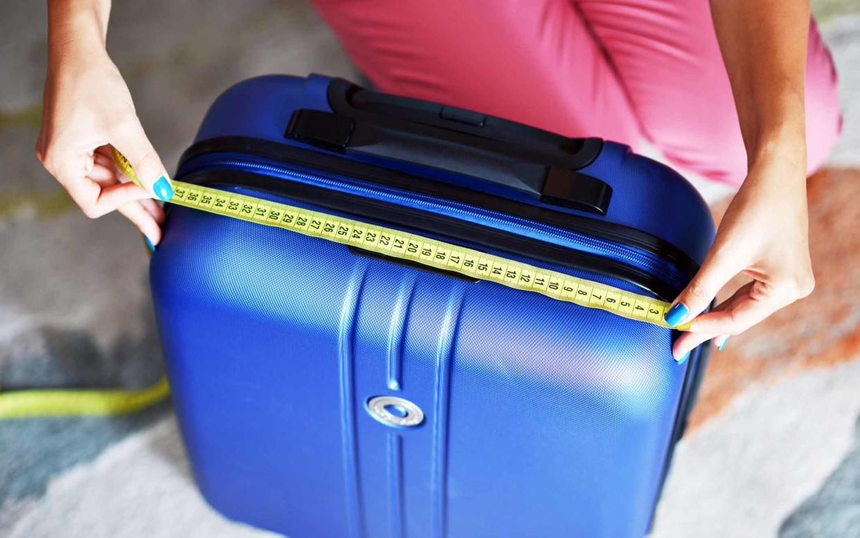 You'll need more than a tape measure to ensure your bag gets on a plane these days - ([None] (Photographer) - [None]