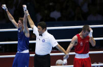 Britain's Luke Campbell (L) is declared the winner over Ireland's John Joe Nevin after their Men's Bantam (56kg) gold medal boxing match at the London Olympics August 11, 2012. REUTERS/Murad Sezer (BRITAIN - Tags: SPORT BOXING OLYMPICS) 