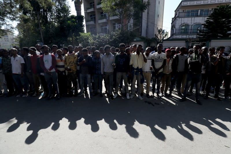 Oromo youth stand guard outside Jawar Mohammed's house, an Oromo activist and leader of the Oromo protest in Addis Ababa