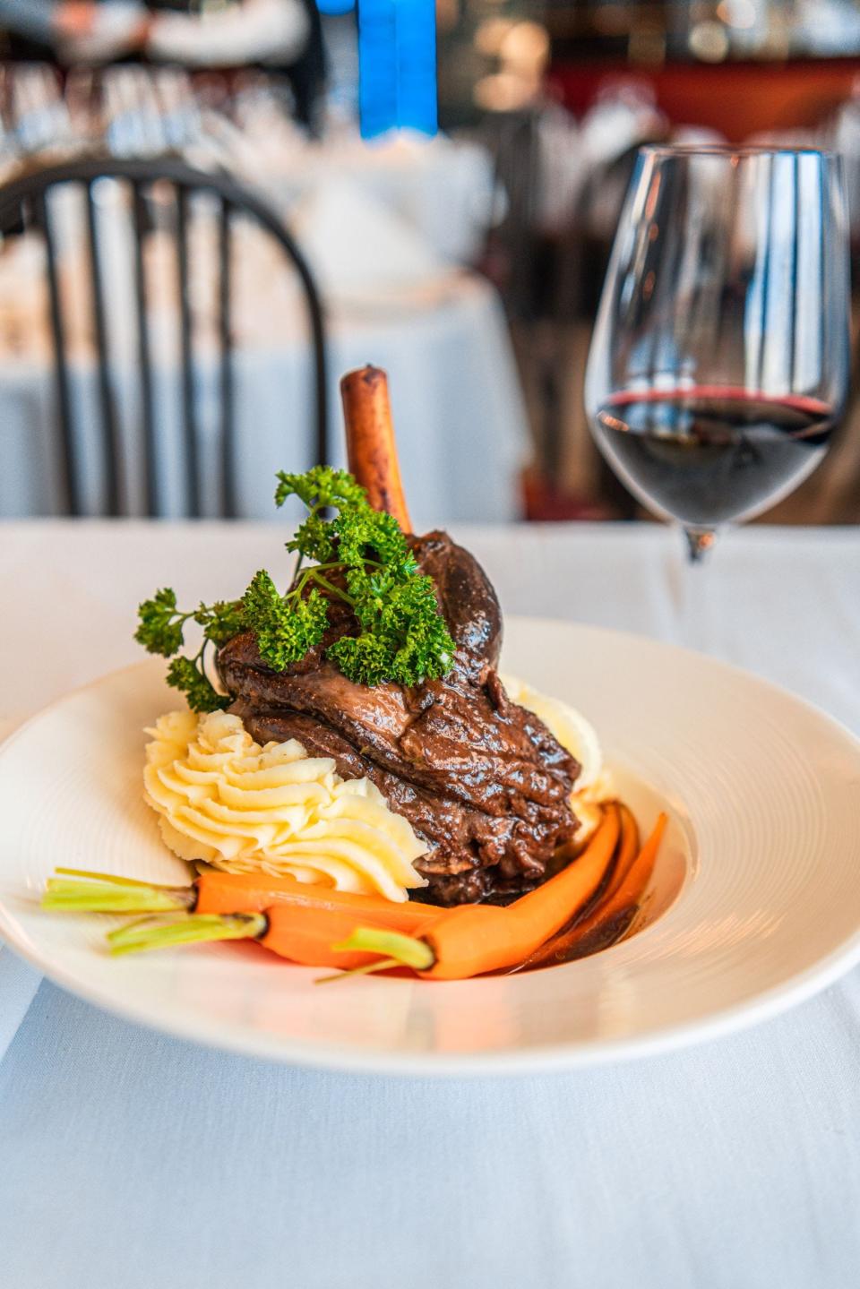 Treat dad to the domestic braised lamb shank in red wine sauce with Yukon gold mashed potatoes at La Goulue for Father's Day.