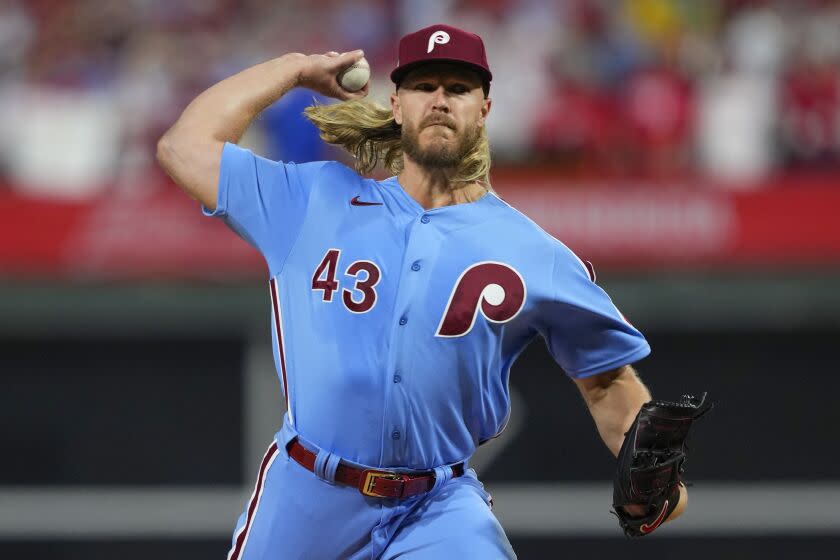 Philadelphia Phillies starting pitcher Noah Syndergaard throws during the first inning in Game 5 of baseball's World Series between the Houston Astros and the Philadelphia Phillies on Thursday, Nov. 3, 2022, in Philadelphia. (AP Photo/Matt Slocum)