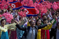 Participants cheer during a parade marking the 70th anniversary of North Korea's founding day in Pyongyang, North Korea, Sunday, Sept. 9, 2018. North Korea staged a major military parade, huge rallies and will revive its iconic mass games on Sunday to mark its 70th anniversary as a nation. (AP Photo/Ng Han Guan)