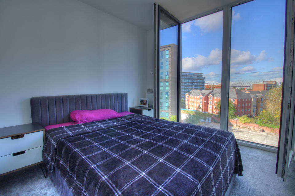 This penthouse flat has a view of Old Trafford football ground.