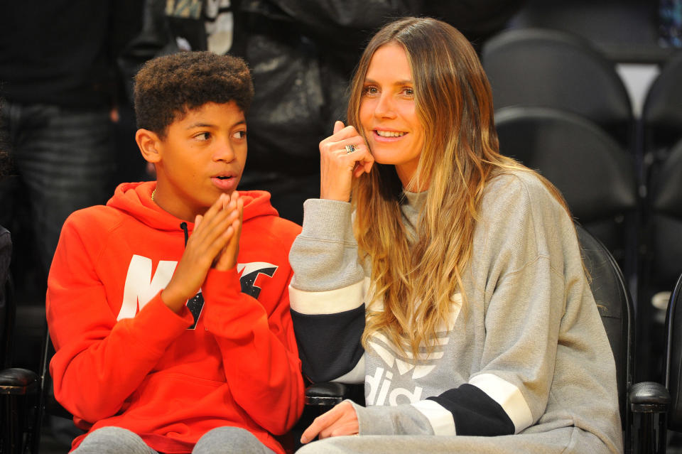 LOS ANGELES, CA - NOVEMBER 15:  Heidi Klum and son Henry attend a basketball game between the Los Angeles Lakers and the Philadelphia 76ers at Staples Center on November 15, 2017 in Los Angeles, California.  (Photo by Allen Berezovsky/Getty Images)