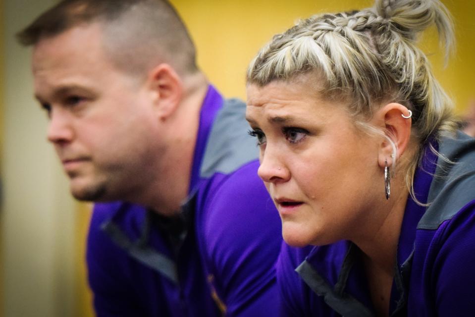 Nevada girls wrestling head coach Tawnia Leslie and her husband Mike, an assistant, watch one of the Cub wrestlers compete during the Nevada Round Robin Tournament Jan. 5 at the Nevada High School Field House.