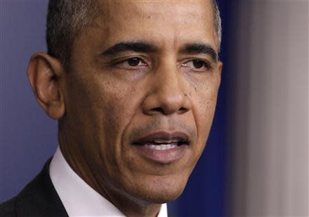 U.S. President Barack Obama speaks to the media in the briefing room of the White House in Washington after the Senate passed the bill to reopen the government October 16, 2013. REUTERS/Yuri Gripas