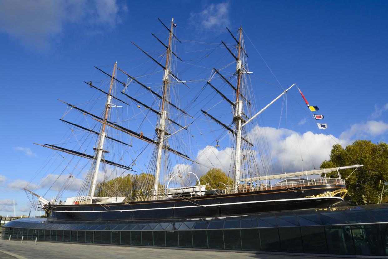 Greenwich, England - 19th November 2013. The Cutty Sark tea clipper ship, located in Greenwich on the banks of the River Thames in London. Tourists tour the ship, now a major tourist attraction, following its restoration after a fire in 2007.