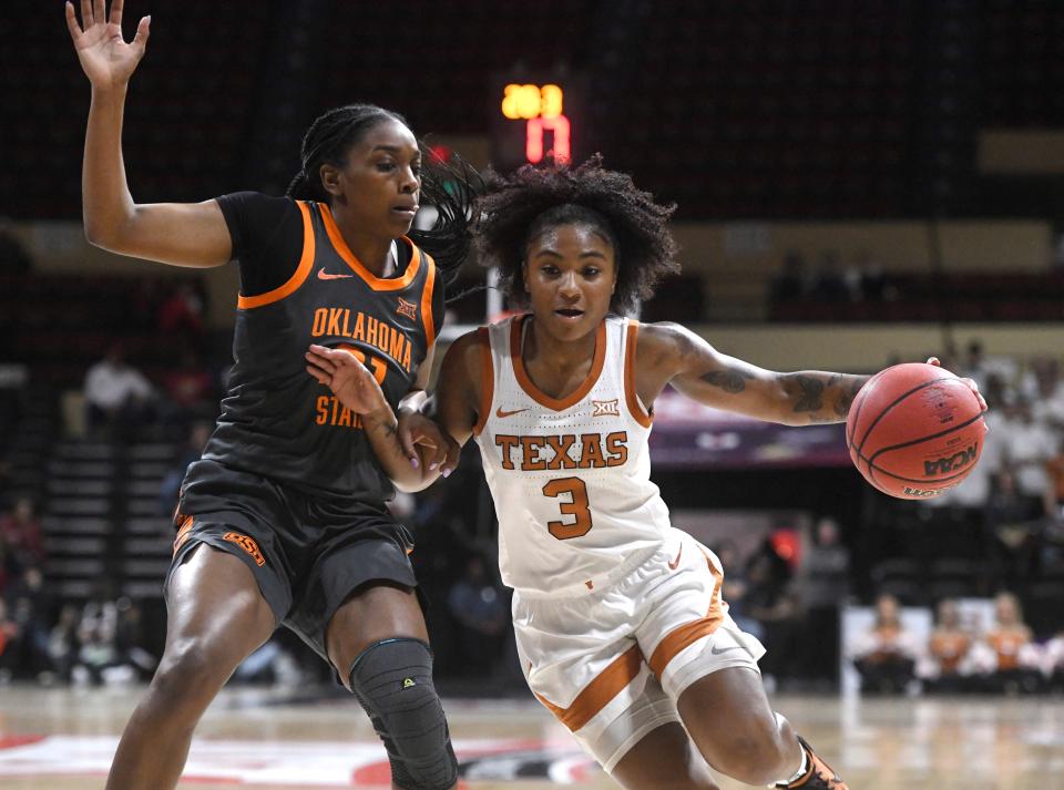 Texas point guard Rori Harmon dribbles past an Oklahoma State defender during the Longhorns' win in the Big 12 Tournament semifinals Saturday.