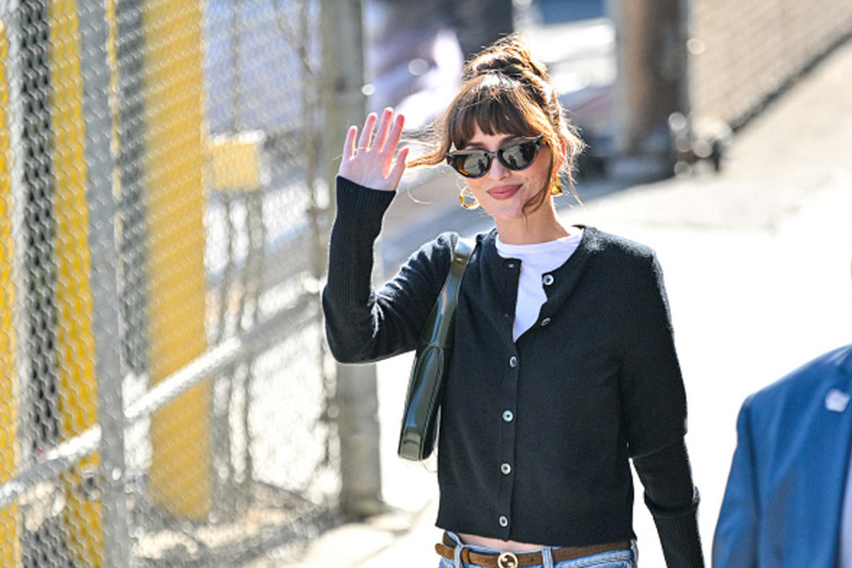 dakota johnson in black cardigan