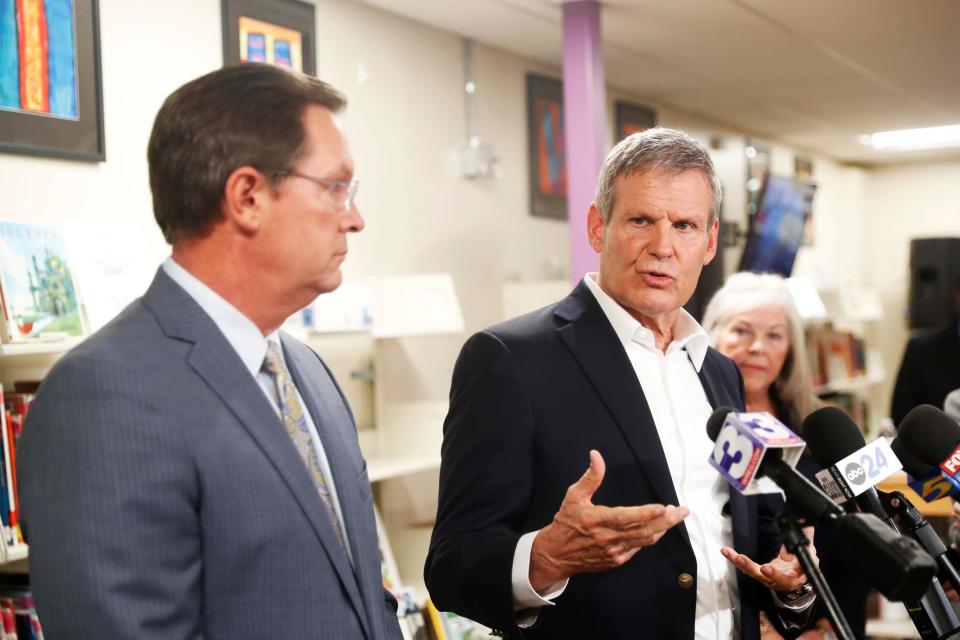 Governor Bill Lee, right, stands next to Speaker Cameron Sexton, left, as he answers a question from the media about school vouchers after a panel consisting of parents, the head of New Hope Christian Academy, and Speaker Cameron Sexton on Wednesday, December 13, 2023 at the New Hope Christian Academy library in Memphis, Tenn.