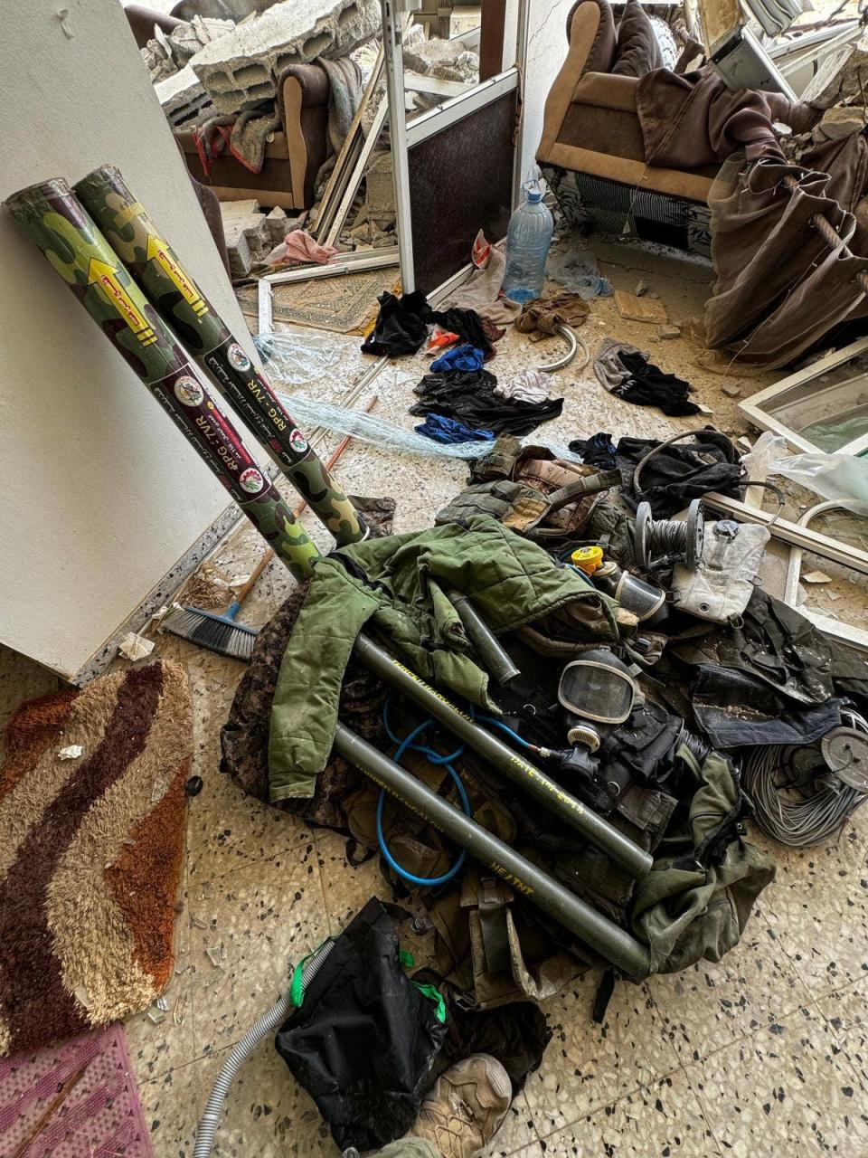 Israeli forces conducted a raid against a Hamas compound in Gaza on Tuesday, uncovering a tunnel and a significant cache of weapons and explosives.