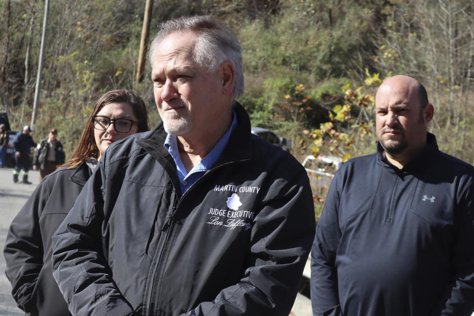 Martin County Judge Executive Lon Lafferty addresses reporters outside a road leading to the abandoned Martin Mine Prep Plant in Inez, K.Y. where the collapse of an 11-story tipple killed at least one man on Wednesday, Nov. 1, 2023. (AP Photo/Leah Willingham)