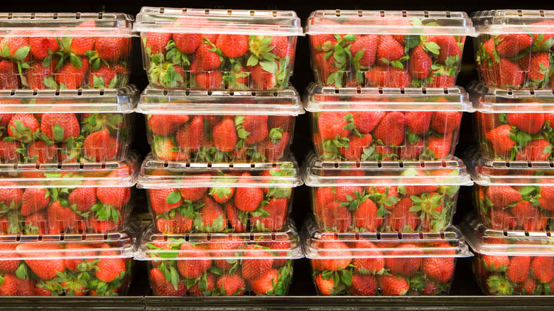 trays of strawberries in supermarket