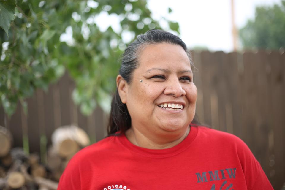 Toni Handboy, a certified peer recovery specialist and a counselor for Wakpa Waste Counseling Services, stands outside of Inka Najin Oti (“The Red House) addiction recovery house in Eagle Butte on the Cheyenne River Reservation on Sunday, June 16, 2023.