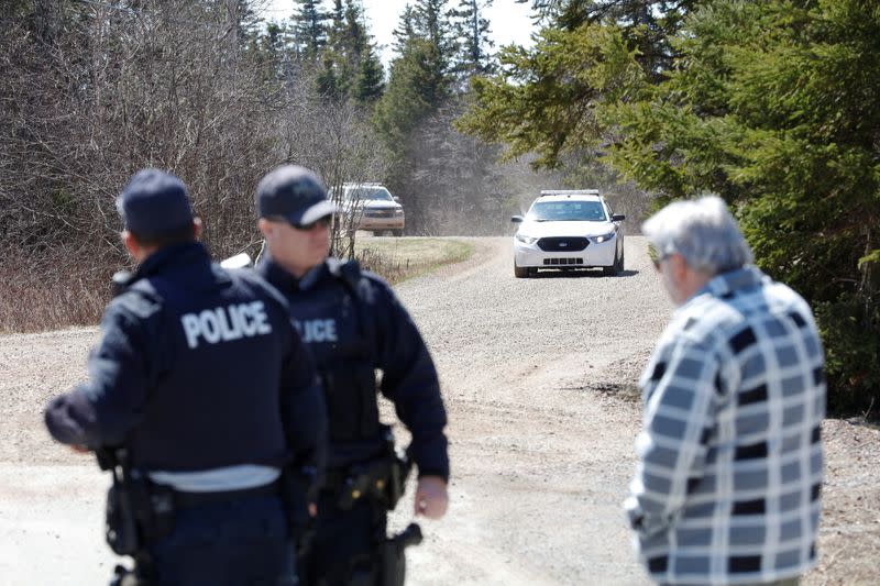 RCMP officers speak with man after Wortman manhunt in Portapique