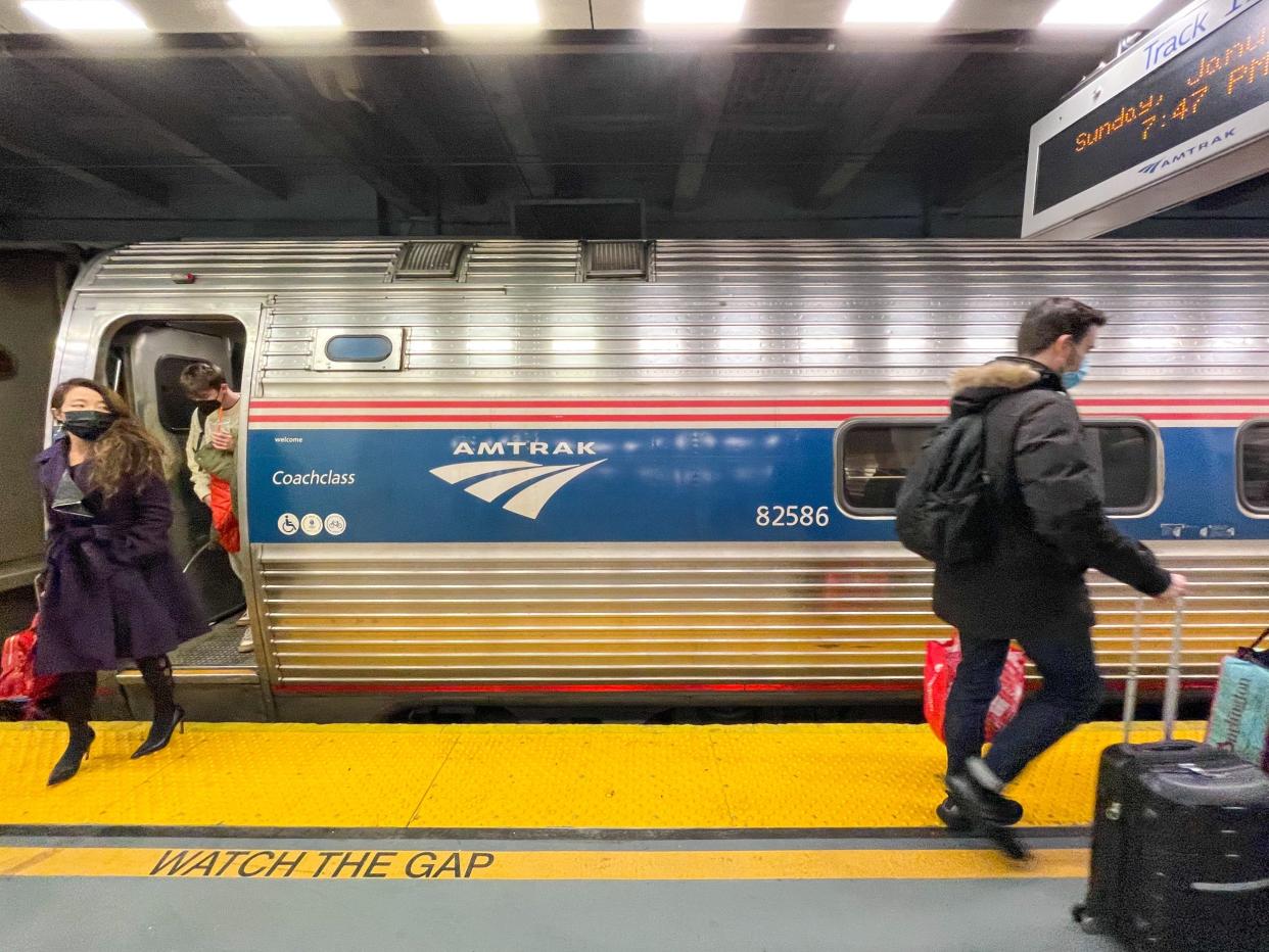 People getting off the Amtrak train in New York.