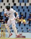 South Africa's Dale Steyn ducks a Peter Siddle delivery during the third day of their cricket test match against Australia in Centurion February 14, 2014. REUTERS/Siphiwe Sibeko (SOUTH AFRICA - Tags: SPORT CRICKET)