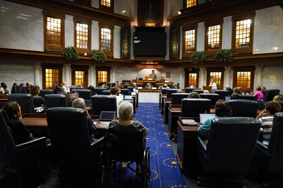 The Indiana Senate Rules Committee takes testimony on a Republican proposal to ban nearly all abortions in the state during a hearing at the Statehouse in Indianapolis, Tuesday, July 26, 2022. (AP Photo/Michael Conroy)