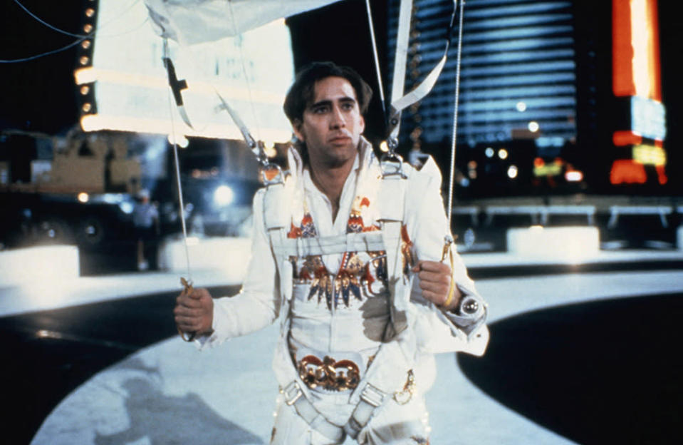 <p>One of Hollywood’s most famously devoted Elvis fans, <a rel="nofollow" href="https://www.yahoo.com/movies/tagged/nicolas-cage" data-ylk="slk:Cage" class="link ">Cage</a> received a <a rel="nofollow" href="https://www.yahoo.com/movies/tagged/golden-globes" data-ylk="slk:Golden Globe" class="link ">Golden Globe</a> nomination for this comedy about a man whose Vegas marriage plans go all wrong — until he wins he back fiancée <a rel="nofollow" href="https://www.yahoo.com/movies/tagged/sarah-jessica-parker" data-ylk="slk:Sarah Jessica Parker" class="link ">Sarah Jessica Parker</a> by — spoiler alert! — joining a team of skydiving Elvis impersonators. —<em>Gwynne Watkins</em> (Photo: Columbia/Everett Collection) </p>