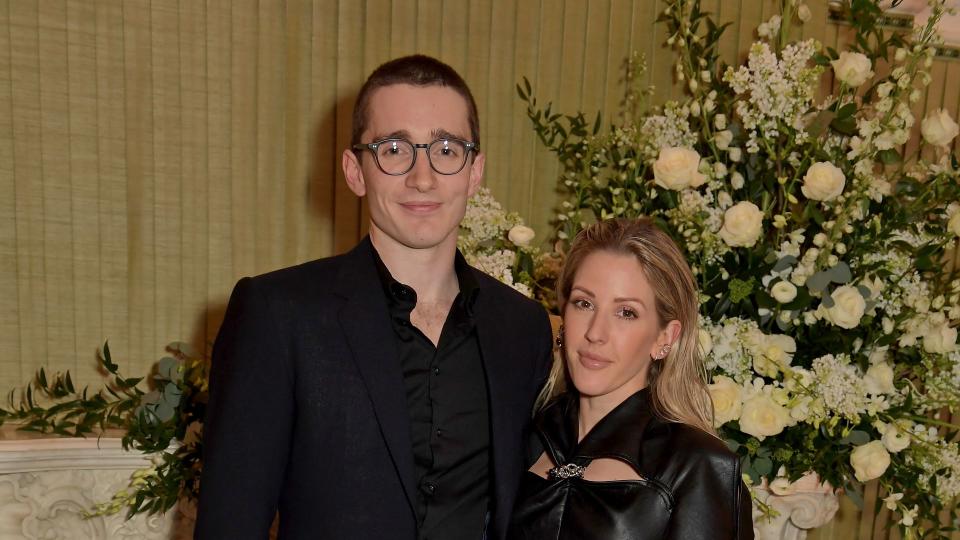 couple in black clothes at vogue event 